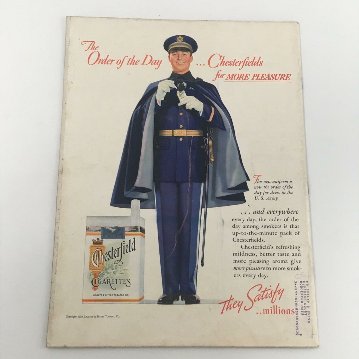 Vintage magazine cover featuring Chesterfield cigarettes advertisement, with a smiling man in a military uniform holding a cigarette pack. Related to the VTG Life Magazine September 5, 1938 Katharine Aldridge Fall Fashions.