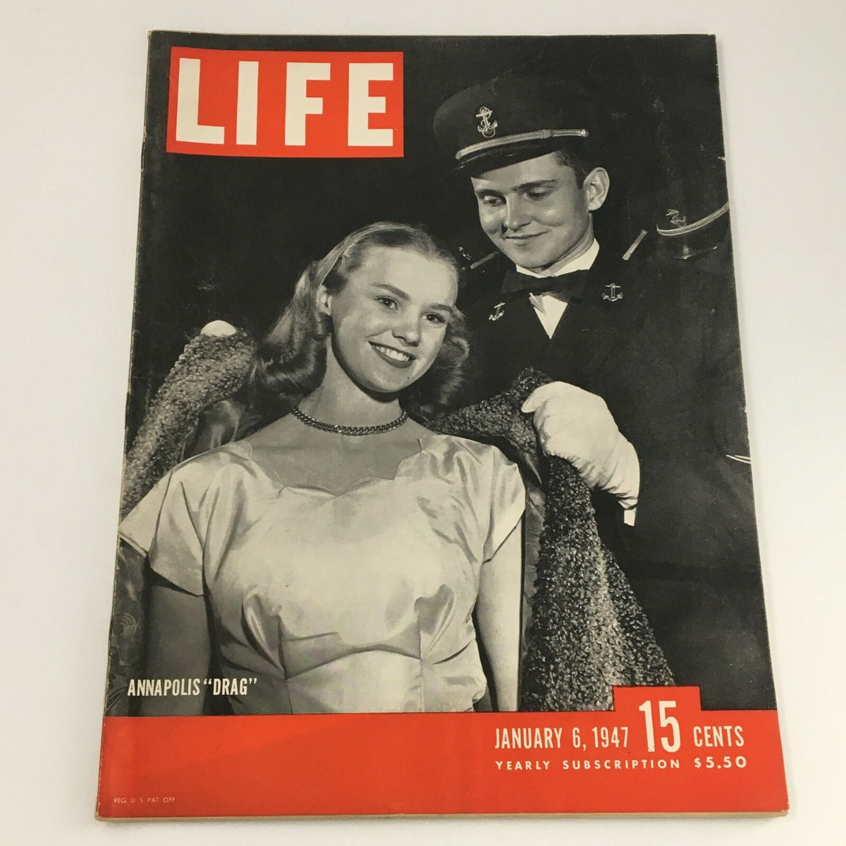 VTG Life Magazine January 6 1947 featuring the 'Drag' cover story centered on Annapolis, showcasing a smiling woman in a satin dress standing next to a male attendant in a navy uniform.