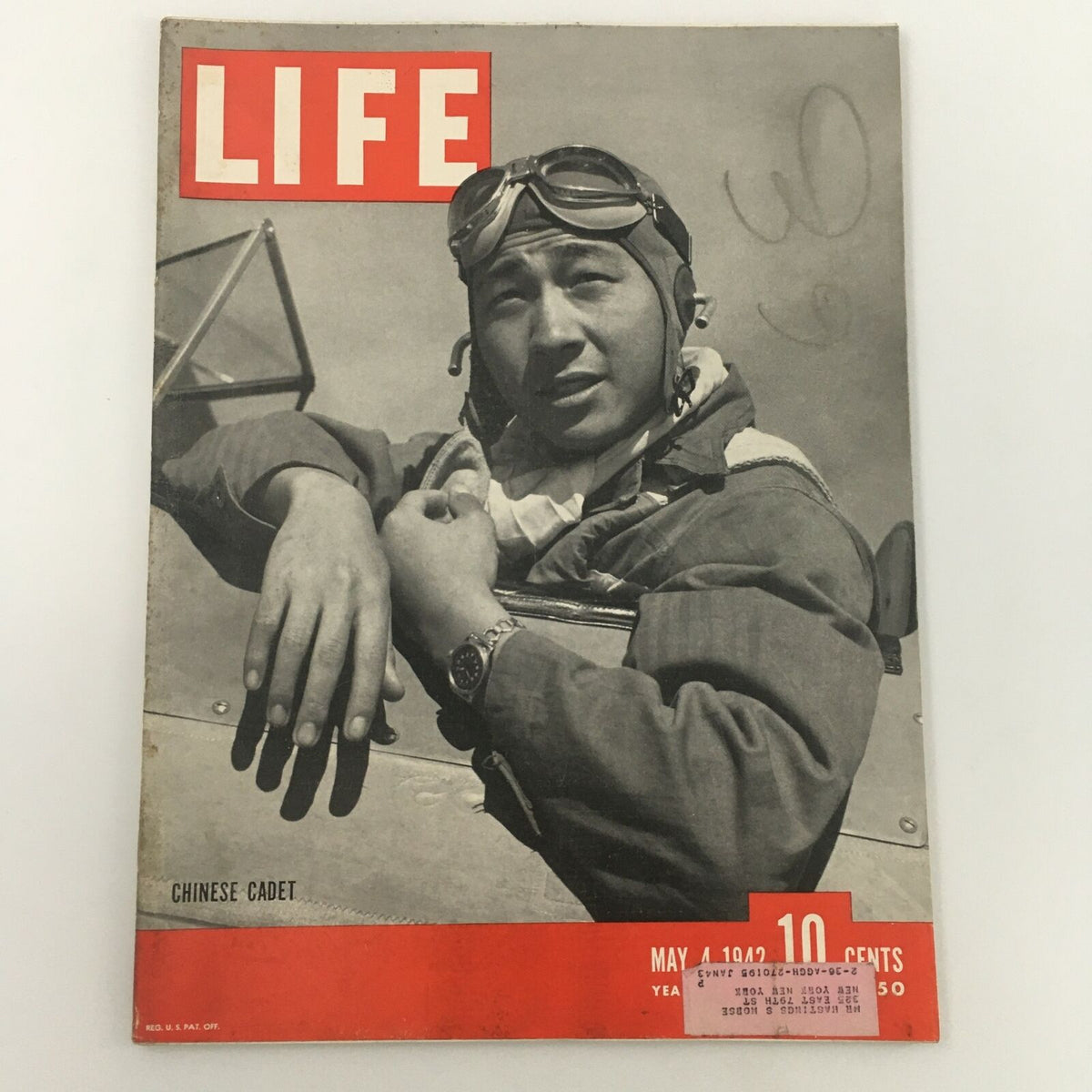 Vintage Life Magazine cover from May 4, 1942 featuring a Chinese cadet posing beside a fighter plane. This iconic image captures a significant moment from World War II, illustrating the youth in aviation.