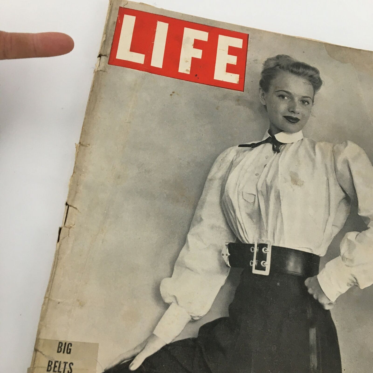 Close-up of the Vintage Life Magazine cover dated November 19, 1945, emphasizing the 'Big Belts' fashion trend and model with a stylish outfit.