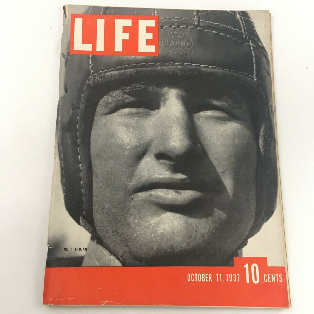 VTG Life Magazine October 11, 1937 Chuck Williams No. 1 Trojan Newsstand cover featuring a close-up of a male figure in a helmet, highlighting historical magazine design.
