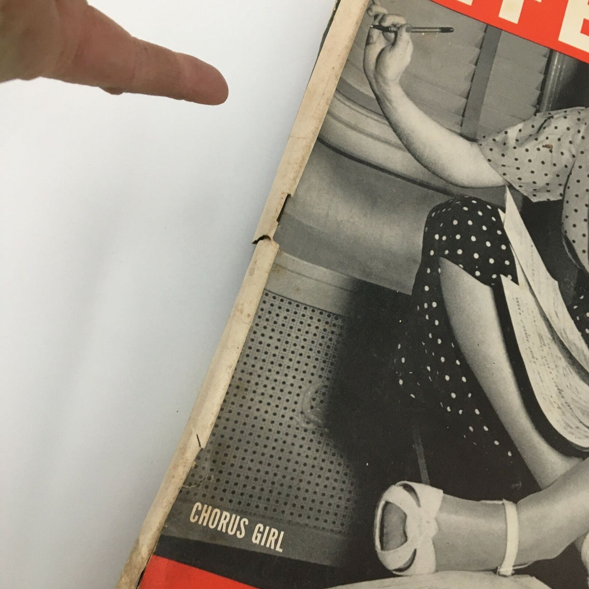 Close-up of the VTG Life Magazine March 18 1940 cover highlighting the chorus girl's details and the magazine title, emphasizing the vintage aesthetic.