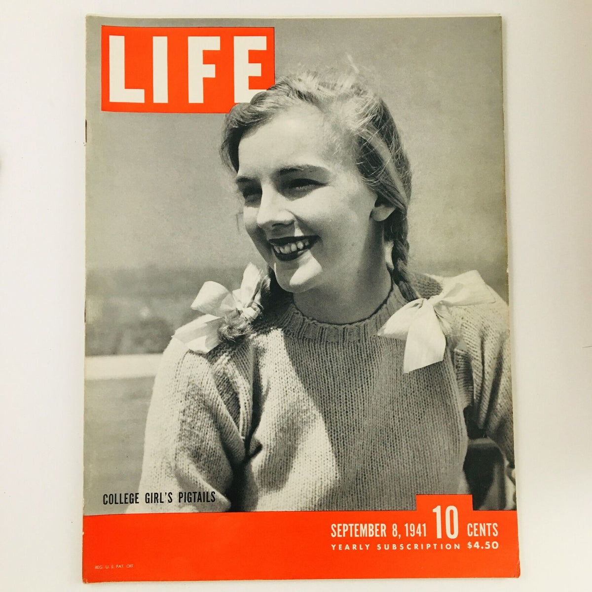 VTG Life Magazine September 8 1941 cover featuring a smiling young woman with pigtails and a sweater, capturing the charm of the era with the title 'College Girl's Pigtails.'