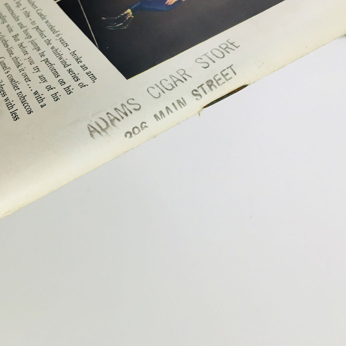 Back cover of the VTG Life Magazine September 8 1941, showing a stamped advertisement for 'Adams Cigar Store' located at 206 Main Street.
