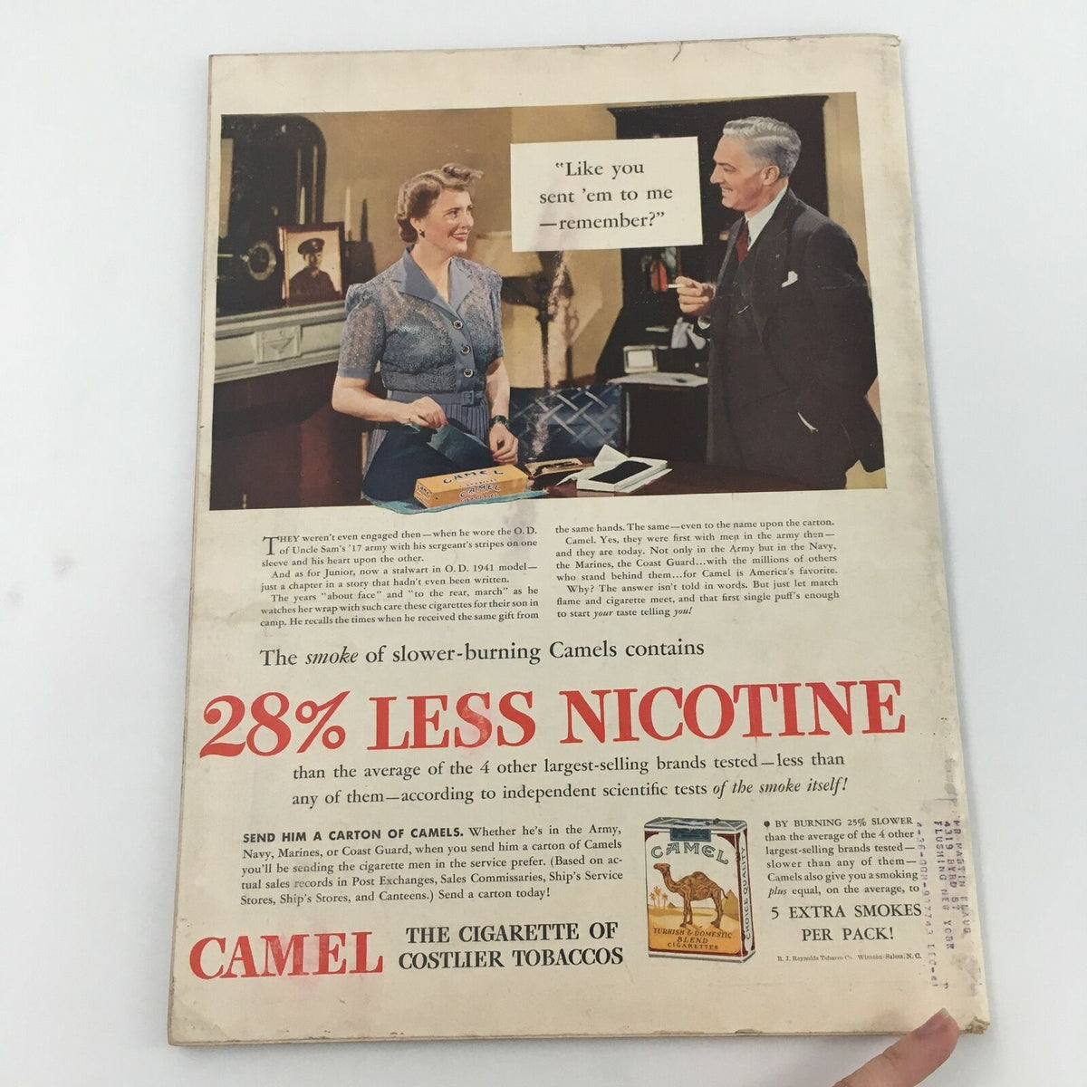 Back cover of Life Magazine from October 6, 1941, displaying a vintage advertisement for Camel cigarettes featuring a woman and a man in a nostalgic setting.