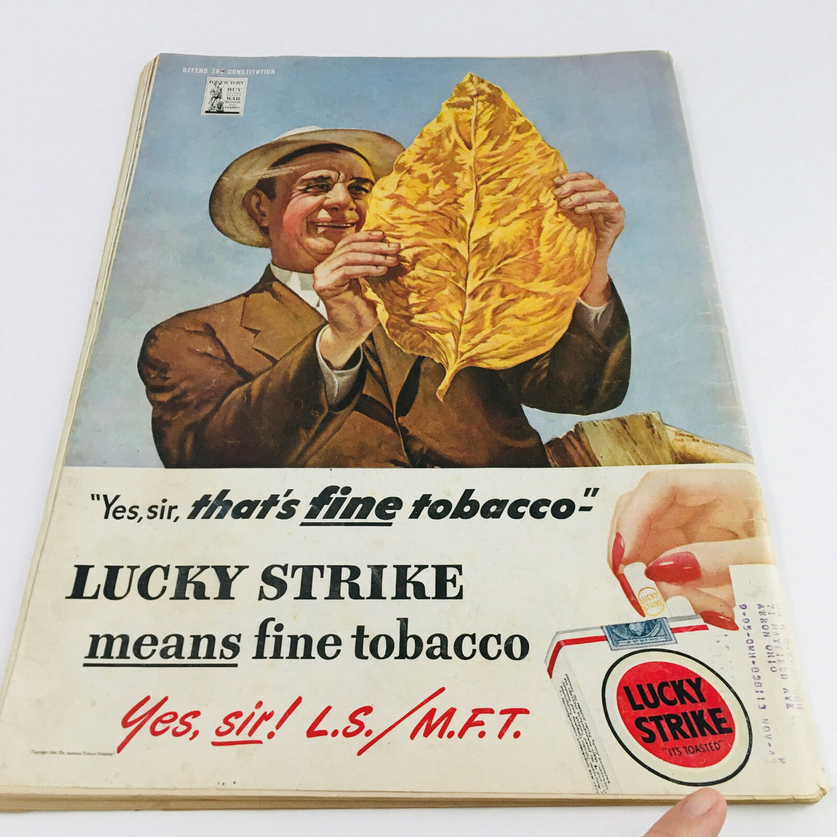 Ad page from VTG Life Magazine November 6 1944, featuring a colorful Lucky Strike tobacco advertisement highlighting tobacco quality.