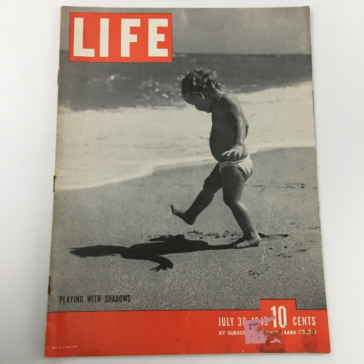 Vintage Life Magazine cover from July 30, 1945 featuring Ella Raines, titled 'Playing with Shadows'. The cover displays a nostalgic image representing 1940s American culture.