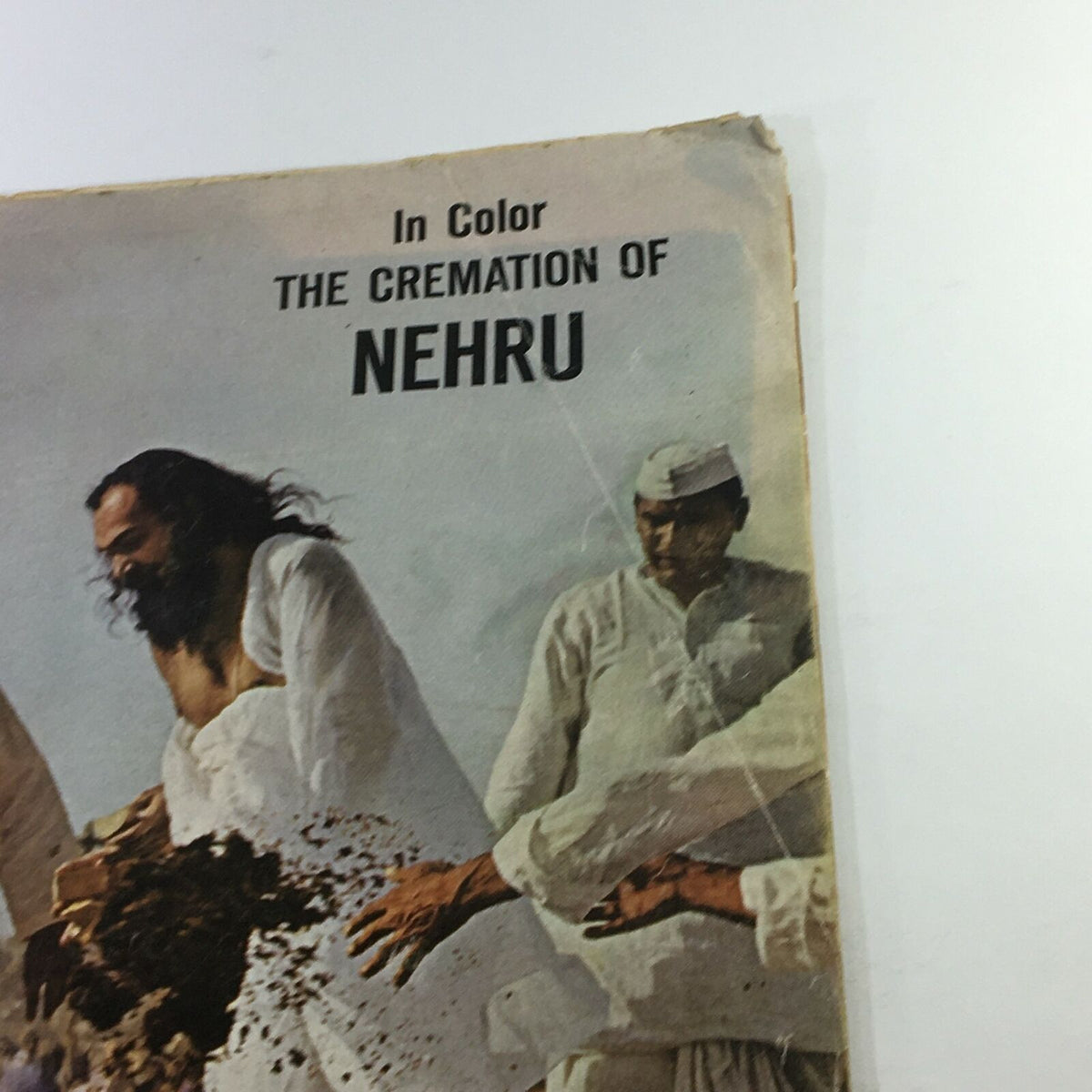 Close-up of the cover of VTG Life Magazine from June 5, 1964, highlighting the title 'In Color The Cremation of Nehru' with a focus on participants at the cremation.