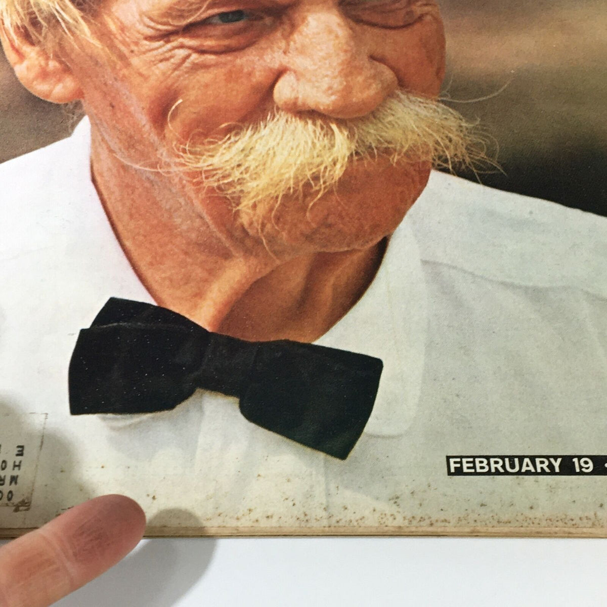 Close-up view of the cover of Vintage Life Magazine February 19 1965, featuring Dr. Albert Schweitzer with a bow tie and detailing the magazine's date and price.
