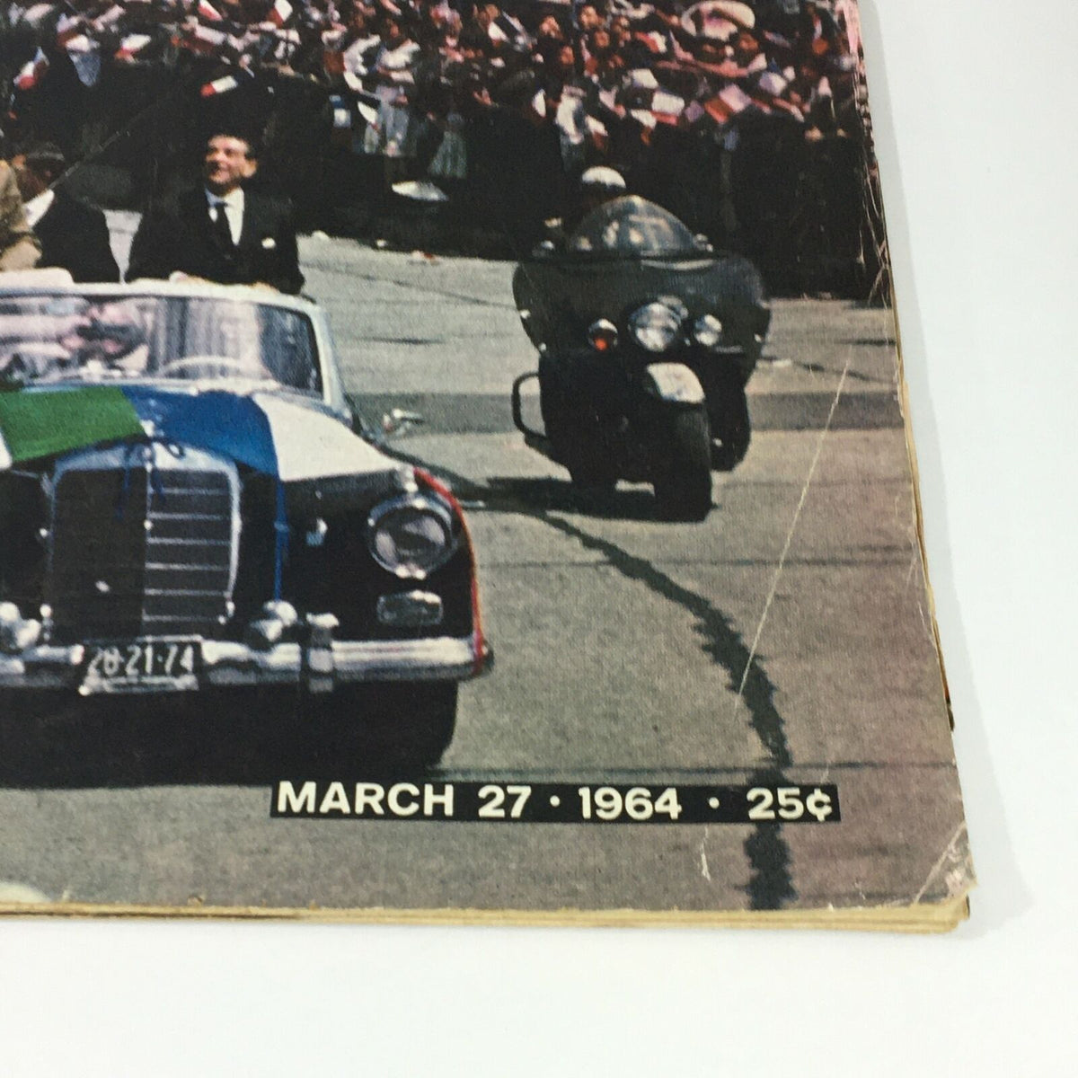 Interior view of vintage Life Magazine from March 27, 1964 featuring Charles de Gaulle, showing the iconic car he traveled in during his visit to Mexico City.