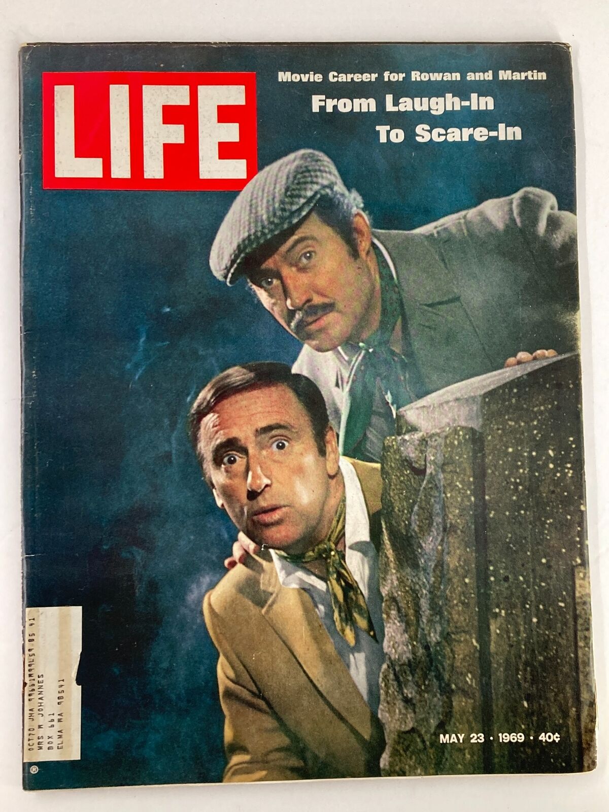 Cover of VTG Life Magazine dated May 23, 1969 featuring Rowan and Martin, titled 'From Laugh-In to Scare-In'. The cover showcases the iconic comedy duo in a dramatic pose, highlighting their transition in entertainment during the late 1960s.