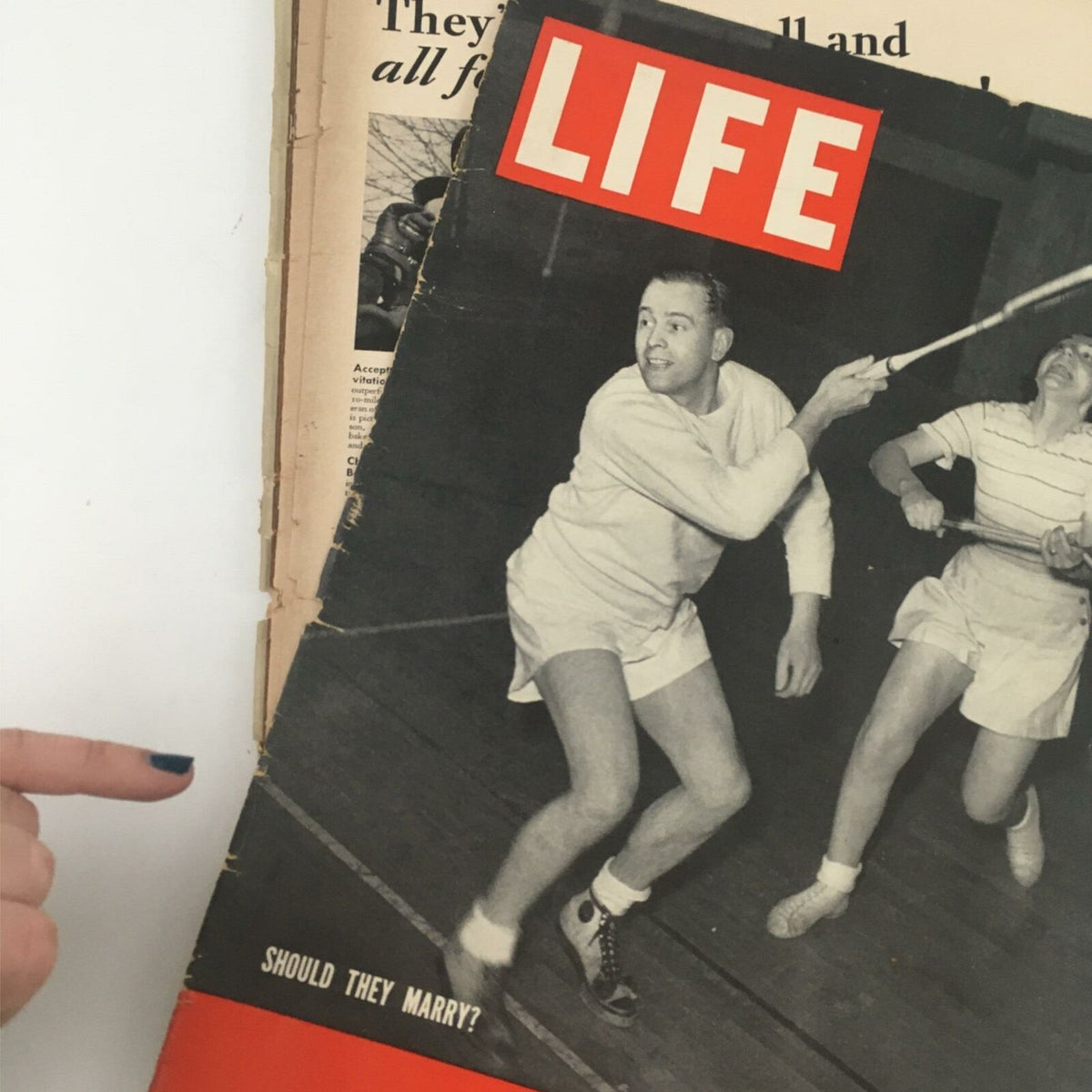 Side view of VTG Life Magazine March 21, 1938, showing the cover and back cover juxtaposed, retaining the focus on the "Should They Marry?" theme along with an advertisement.
