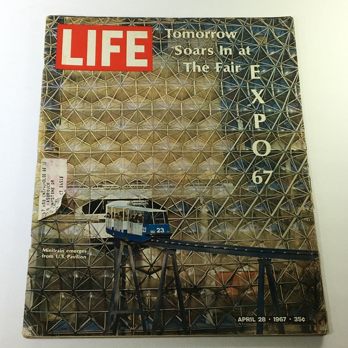 VTG Life Magazine April 28 1967 Cover featuring Minitrain emerging from U.S. Pavilion with a backdrop of the Expo 67 theme, capturing the innovative spirit of the late 1960s.