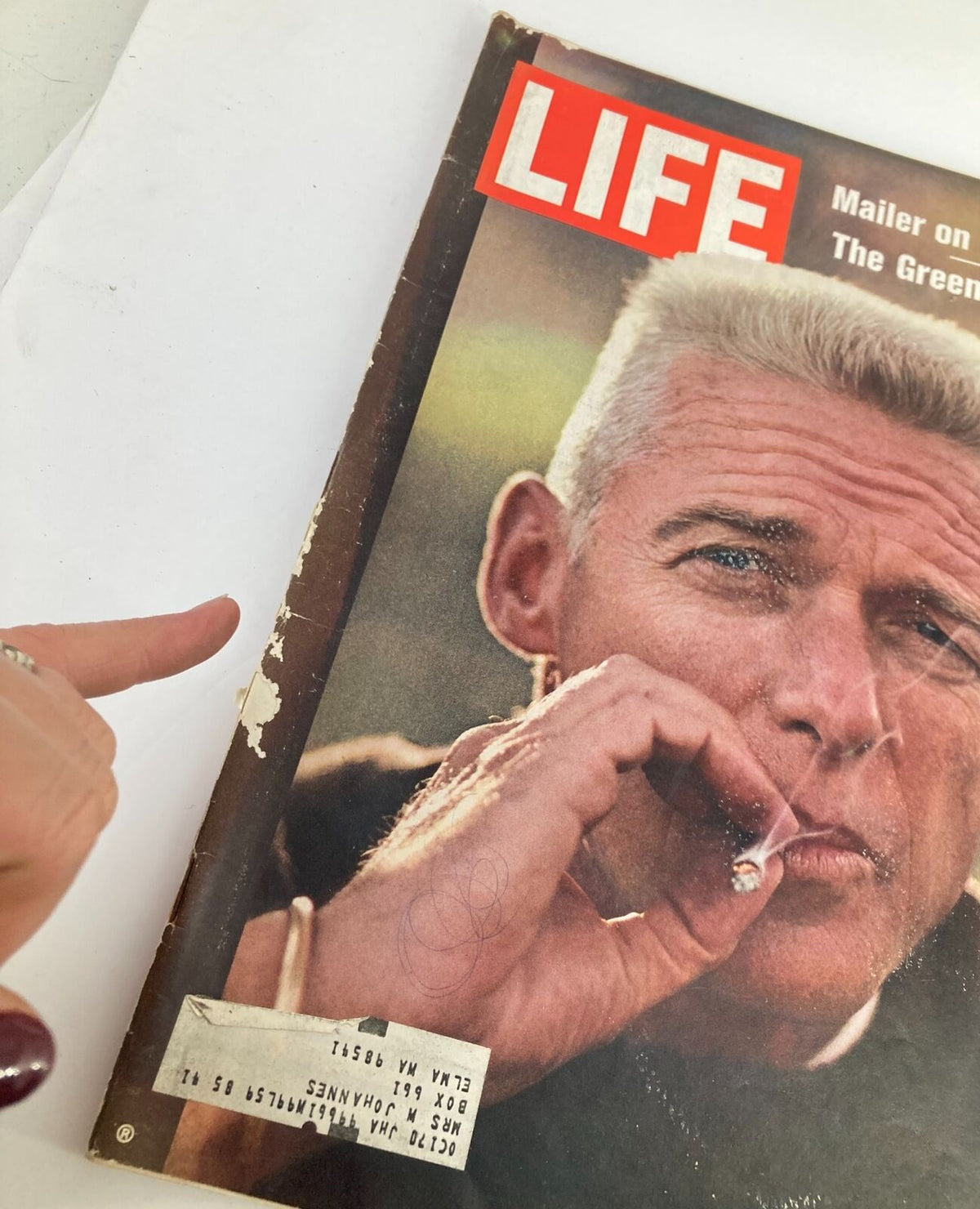 Close-up of VTG Life Magazine November 14, 1969, highlighting Colonel Rheault with a cigarette, including details of wear and an address label, emphasizing its vintage character.
