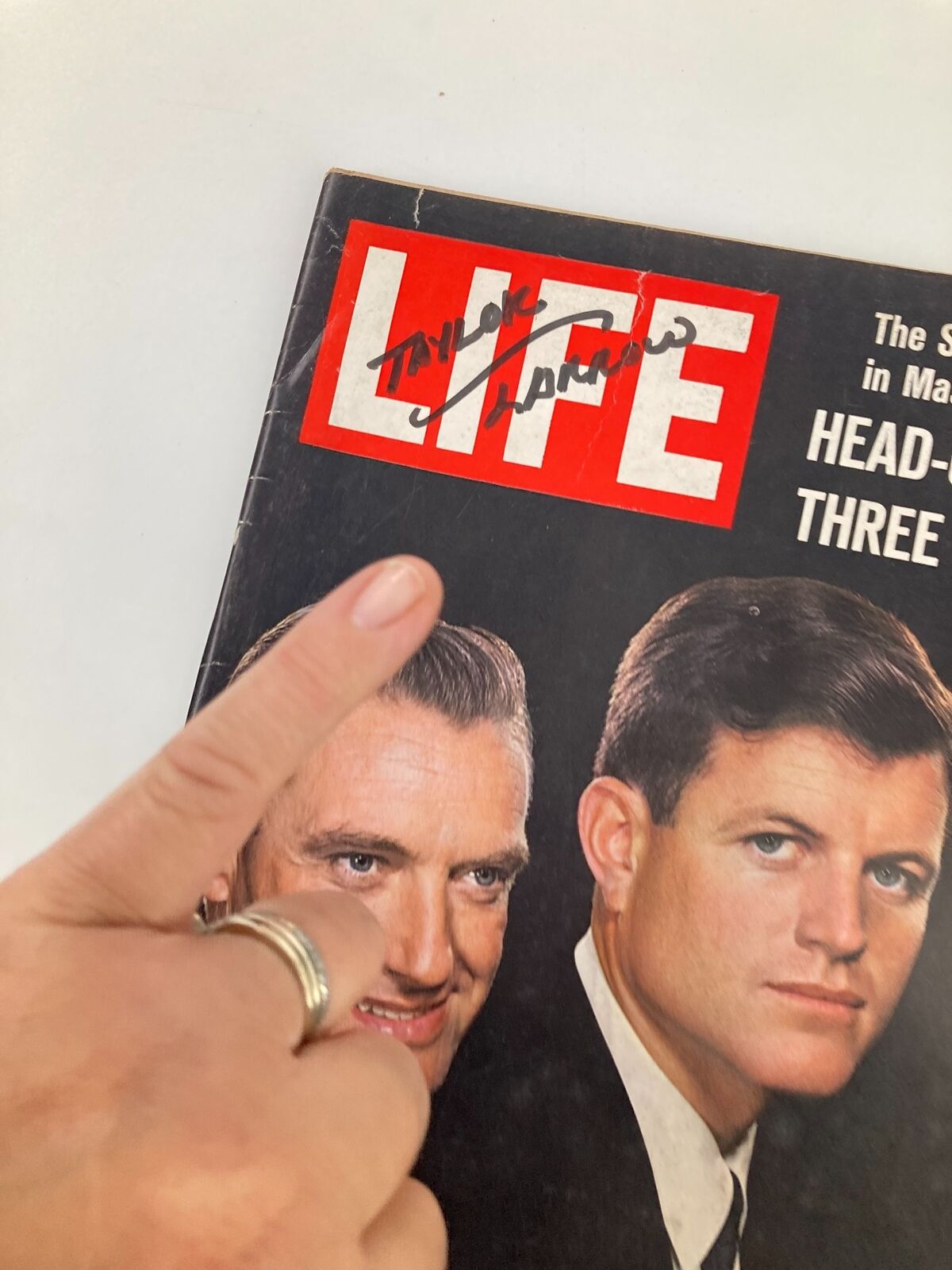 Close-up of the vintage Life Magazine cover from June 29, 1962, showing the signature 'Taylor' above Eddie McCormack and Teddy Kennedy's portraits.