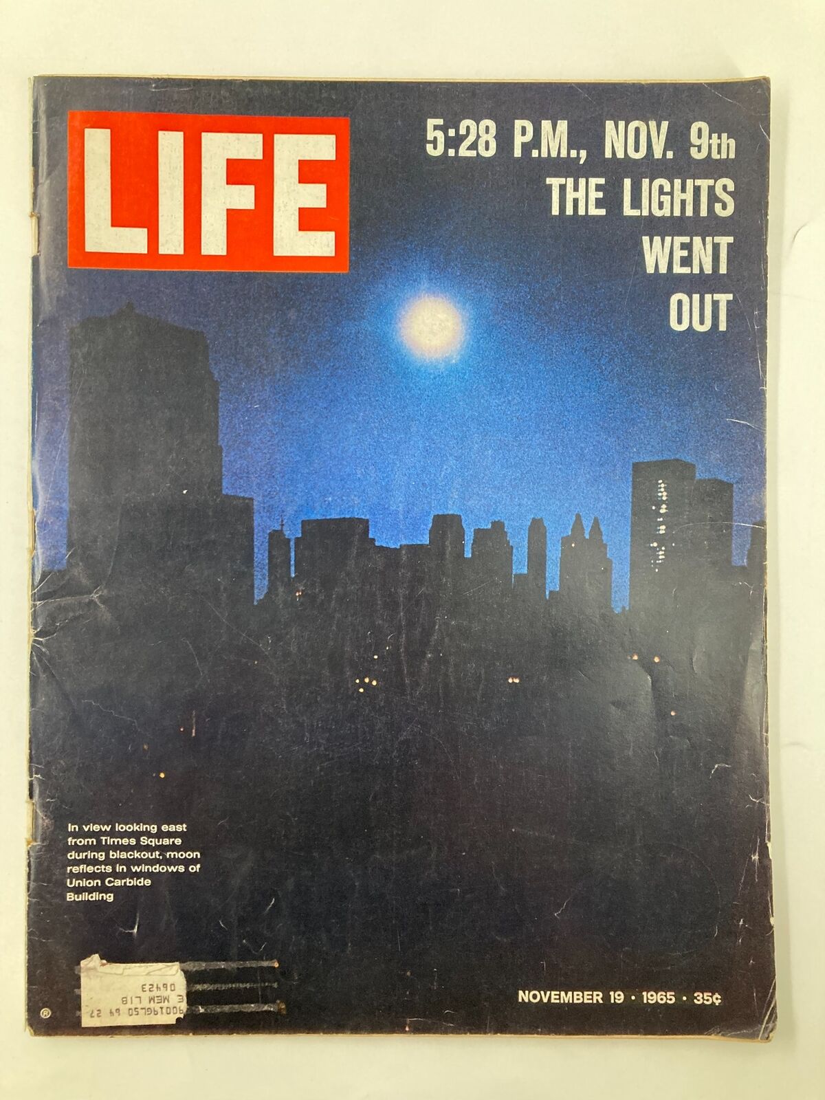 Cover of VTG Life Magazine November 19 1965, featuring a view looking east from Times Square during a blackout, with a moonlit skyline and city silhouettes.
