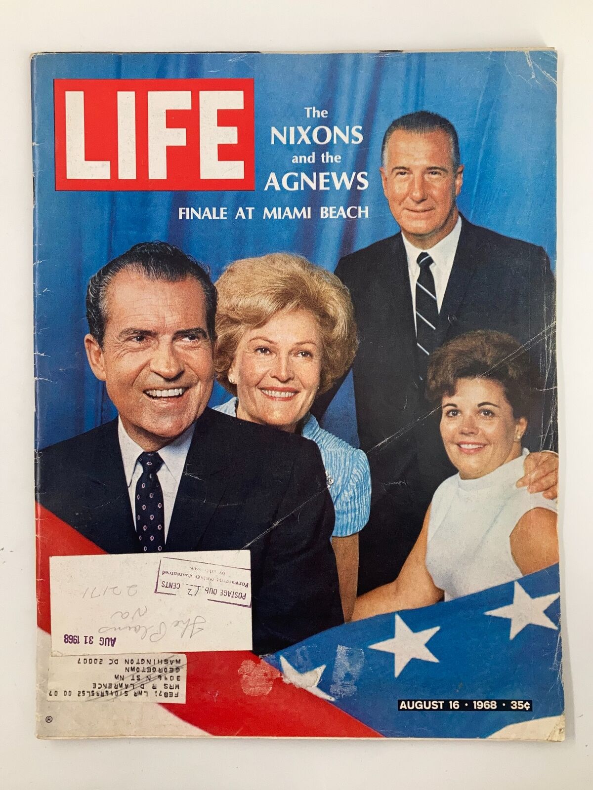 Vintage Life Magazine August 16 1968 featuring the Nixons and the Agnews at Miami Beach, showcasing a group photo of prominent figures in a historic setting.