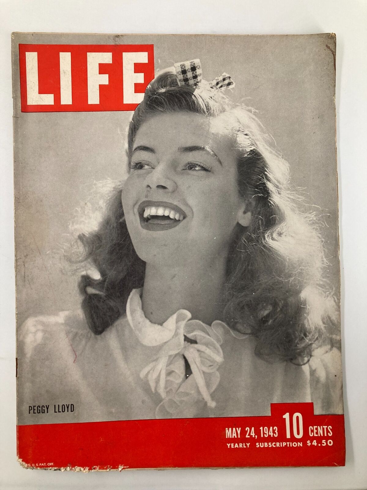 VTG Life Magazine May 24 1943 featuring cover photo of Peggy Lloyd, showcasing a smiling young woman with blonde hair.