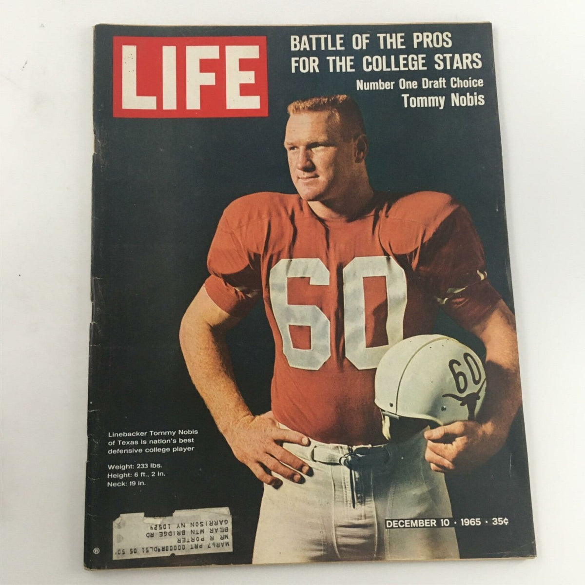 Vintage Life Magazine December 10, 1965 featuring linebacker Tommy Nobis in a red jersey with the number 60 and a football helmet, showcasing a historic moment in collegiate football.