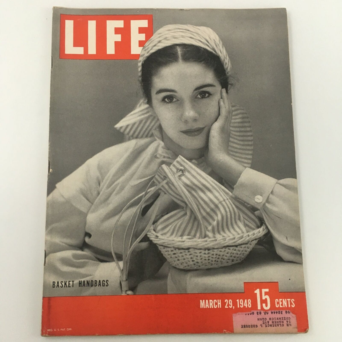 Cover of VTG Life Magazine March 29 1948 featuring a model with a basket handbag, showcasing 1940s fashion and craftsmanship.
