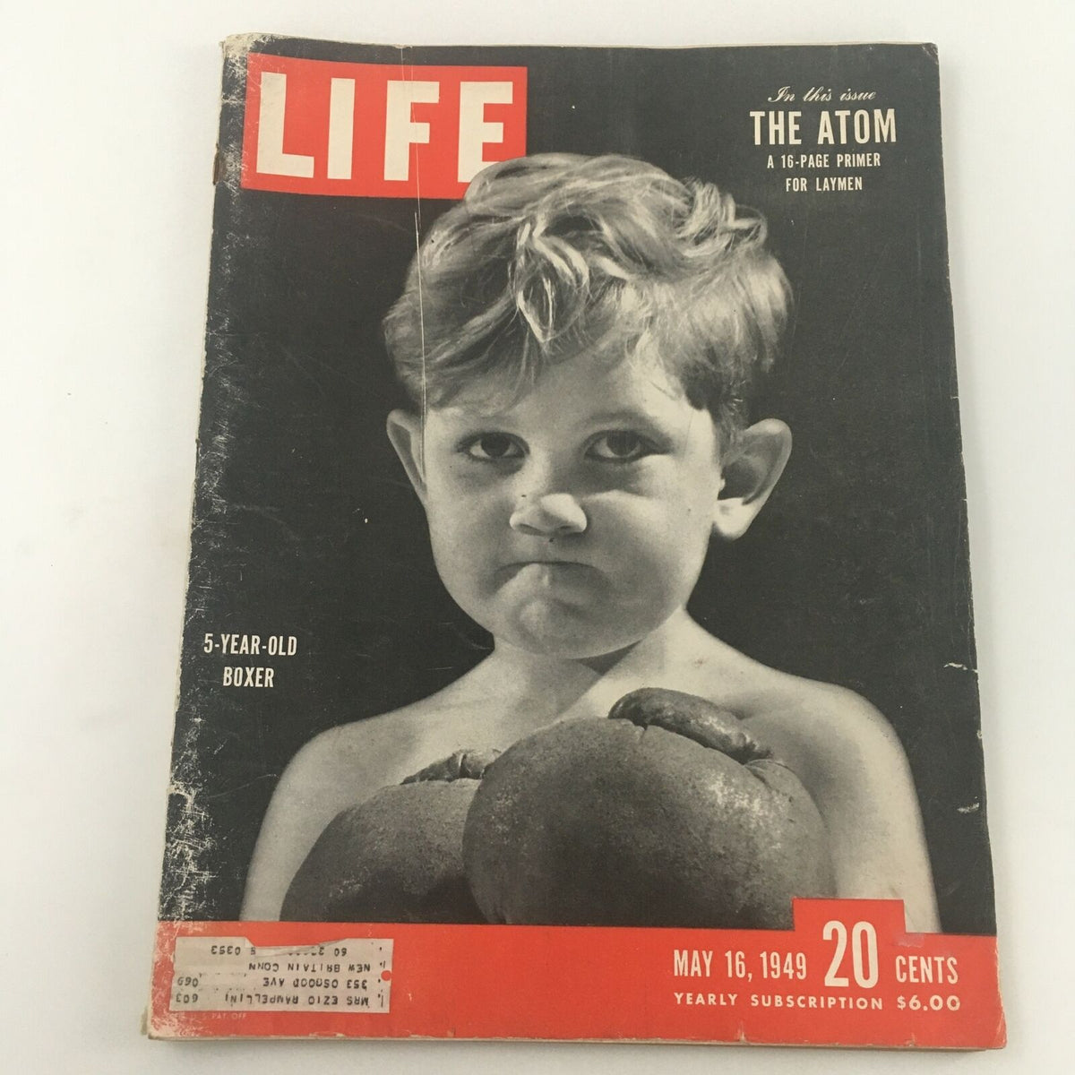 VTG Life Magazine May 16 1949 cover featuring a 5-year-old boxer with boxing gloves and the title 'The Atom: A 16-Page Primer for Laymen'. The magazine displays vintage wear indicative of its age.