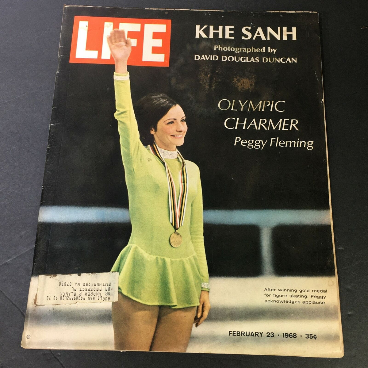 Cover of VTG Life Magazine February 23 1968 featuring Khe Sanh photograph by David Douglas Duncan, highlighting Olympic gold medalist Peggy Fleming in figure skating attire.