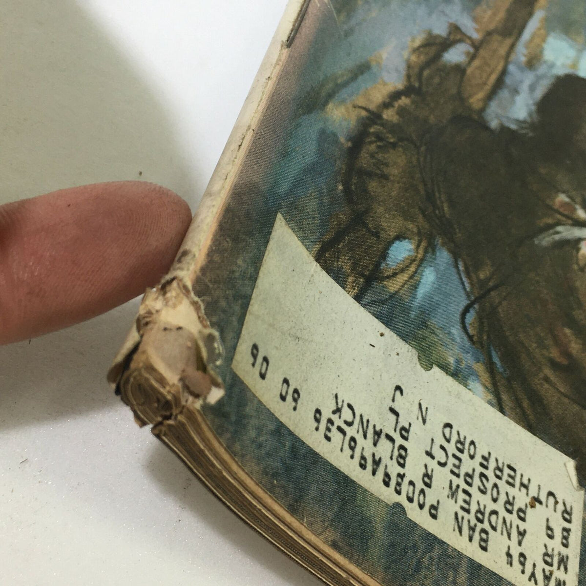 Close-up of the spine of the Vintage Life Magazine May 10, 1963, emphasizing minor wear and a small address label, showcasing its character as a historical collectible.