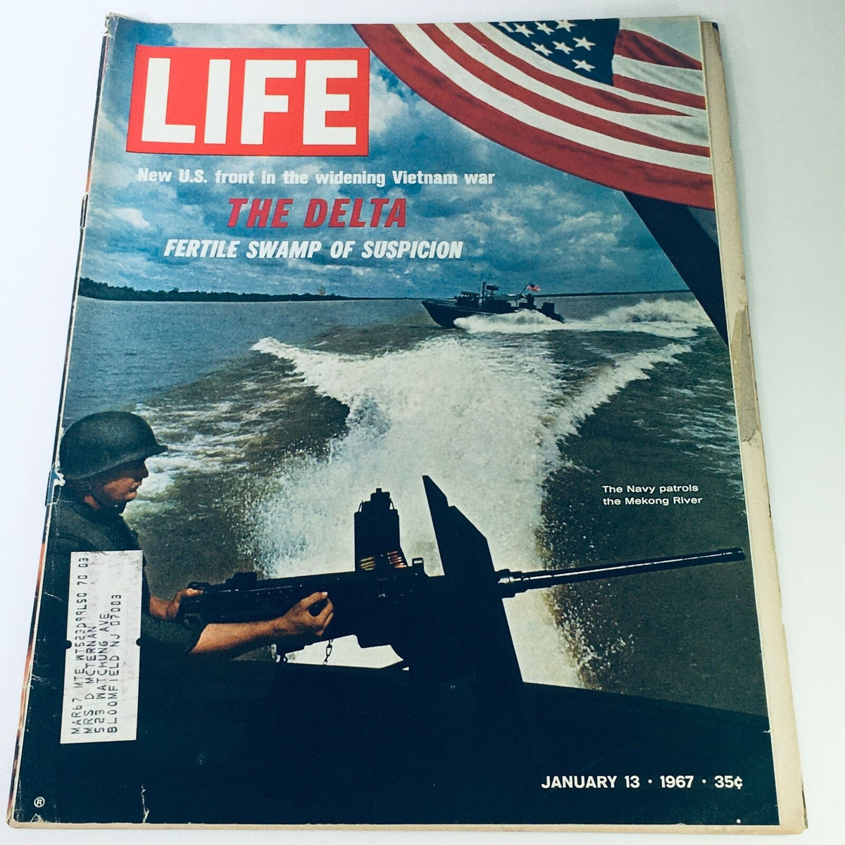 Cover of VTG Life Magazine from January 13, 1967 featuring 'The Delta: Fertile Swamp of Suspicion' with a soldier and a Navy boat on the Mekong River. Vintage magazine appealing to collectors and history enthusiasts.