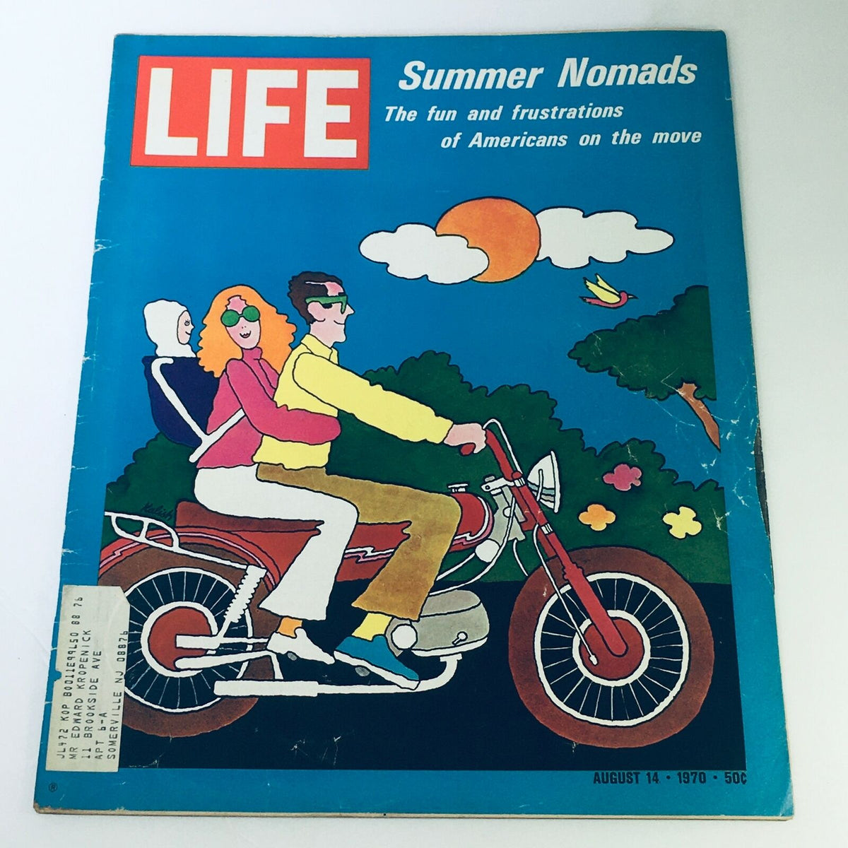 Cover of VTG Life Magazine August 14 1970 featuring humorous illustration of people riding a motorcycle titled 'Summer Nomads' highlighting the fun and frustrations of Americans on the move.