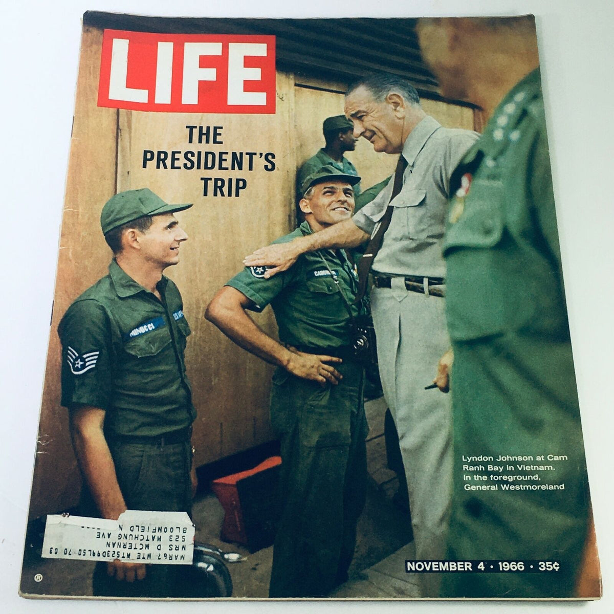 Life Magazine Cover from November 4, 1966 featuring President Lyndon Johnson at Cam Ranh Bay in Vietnam, showcasing a significant historical moment with military personnel.