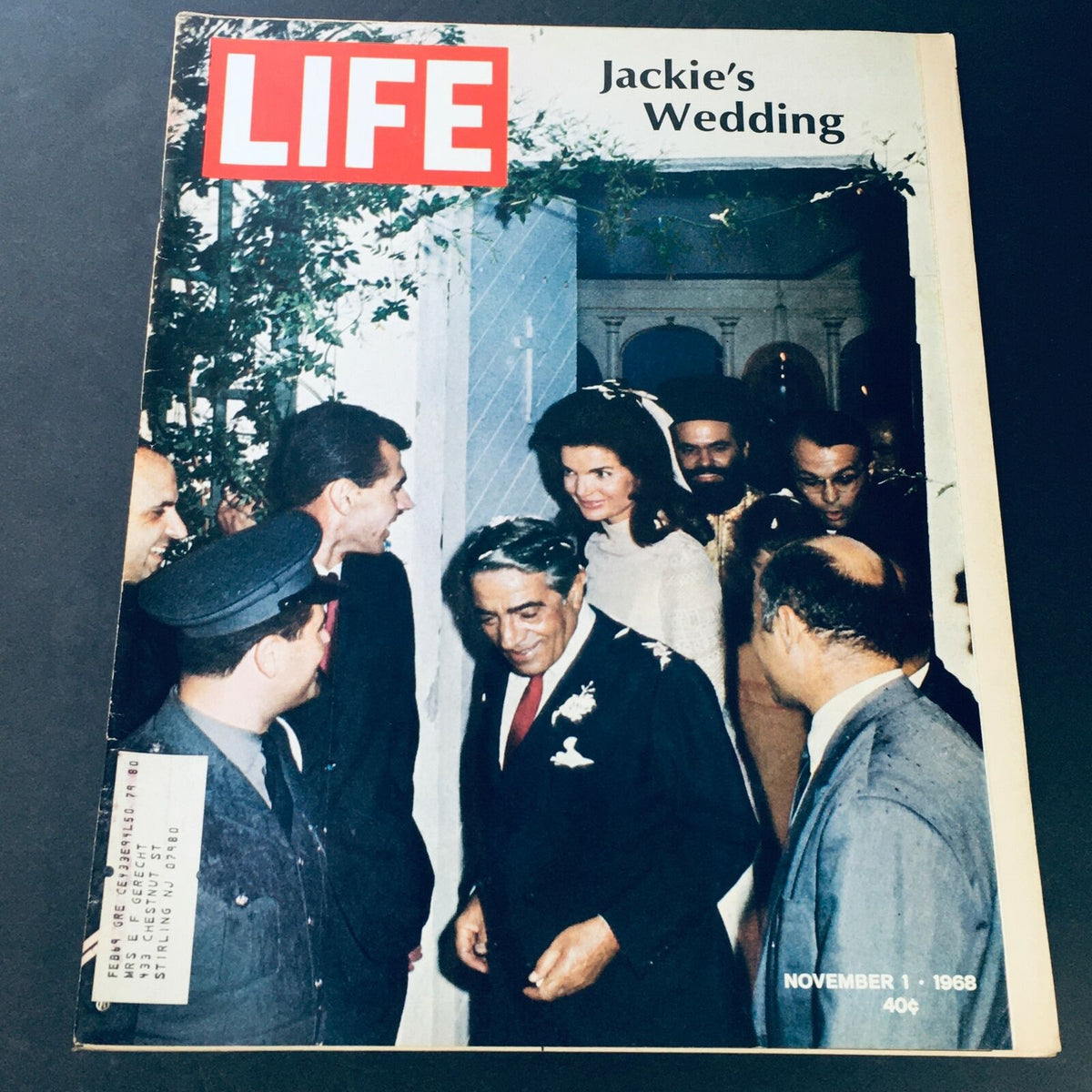 VTG Life Magazine November 1 1968 featuring Jacqueline Kennedy Onassis' wedding on the cover, showcasing a moment from the celebration with guests, capturing the elegance and historical significance of the event.