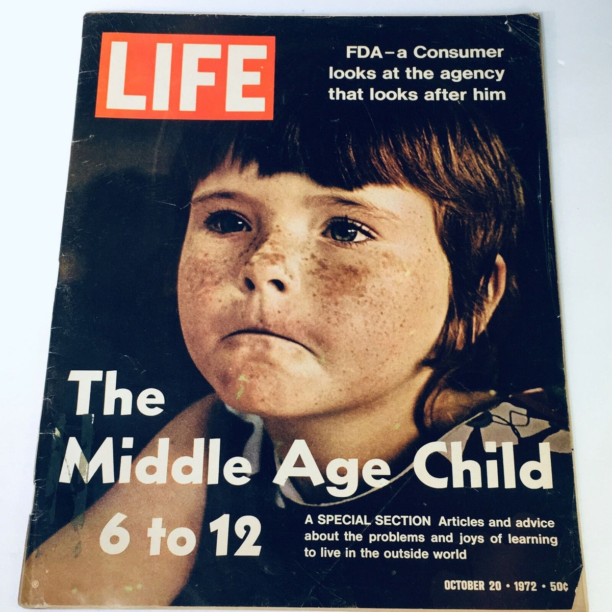 Cover of VTG Life Magazine from October 20, 1972, featuring the title 'The Middle Age Child 6 to 12', showcasing a close-up of a freckled child with a serious expression, illustrating themes of childhood development during that era.