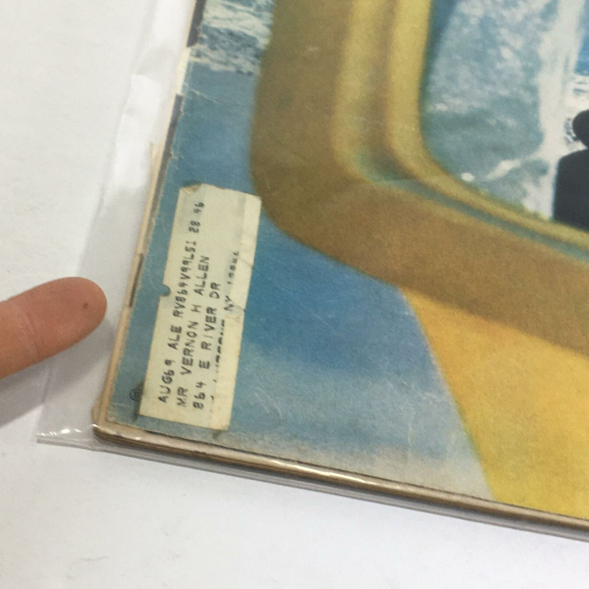 Detailed view of the edge of VTG Life Magazine: Sea Probe - October 4 1968, highlighting an address label and signs of age on the cover.