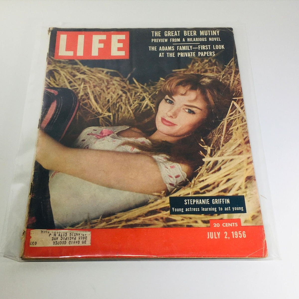 VTG Life Magazine Cover from July 2, 1956 featuring Stephanie Griffin with the title 'The Great Beer Mutiny' and 'The Adams Family - First Look at the Private Papers'. This vintage magazine offers a glimpse into the 1950s culture.