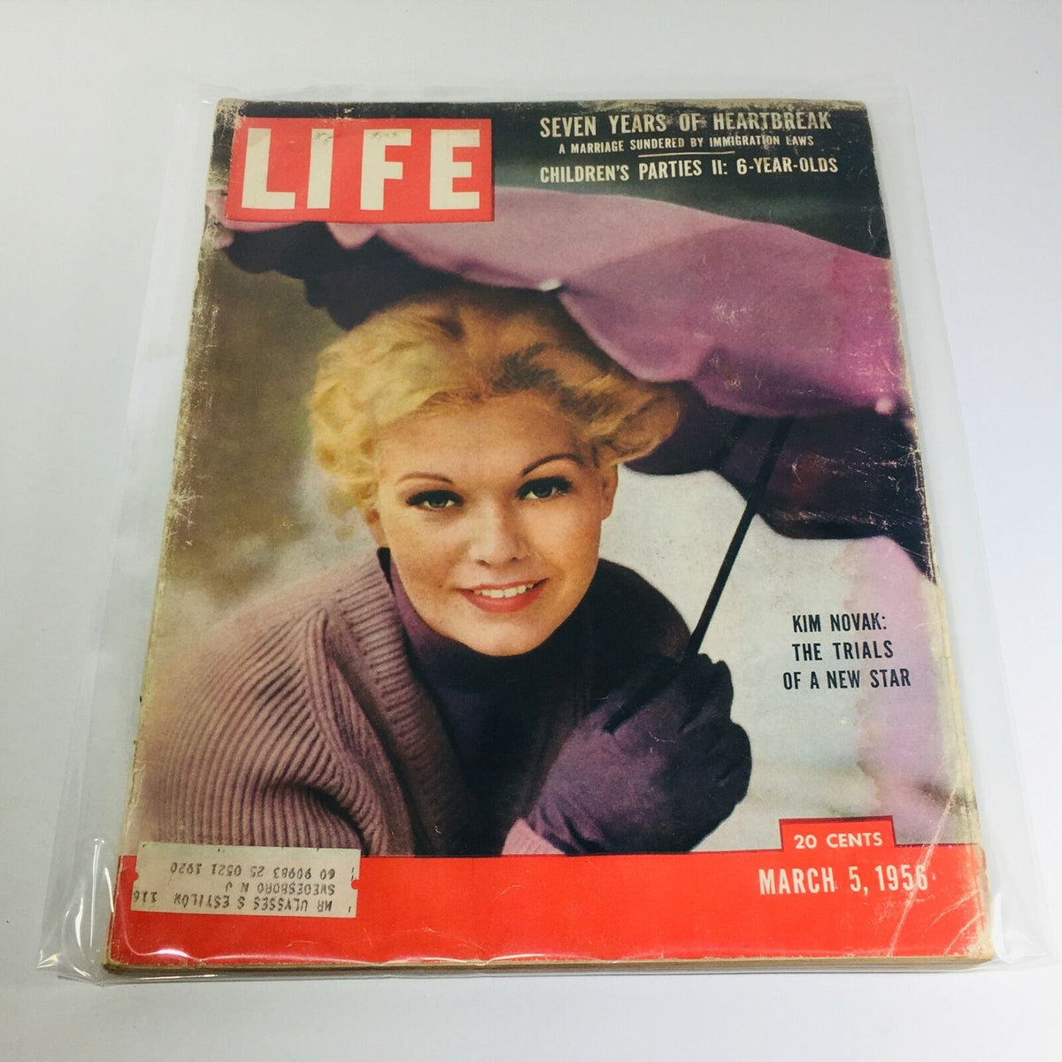 VTG Life Magazine cover from March 5, 1956 featuring Kim Novak, highlighting the article 'Seven Years of Heartbreak', and themes on children's parties.
