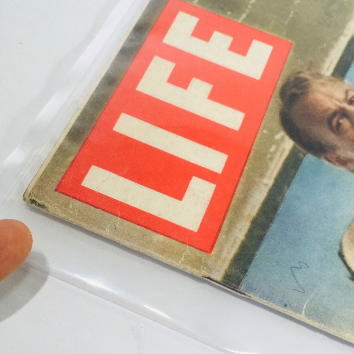 Close-up of the 'LIFE' logo on the VTG Life Magazine Cover from July 16, 1956, focusing on the vintage style and condition.