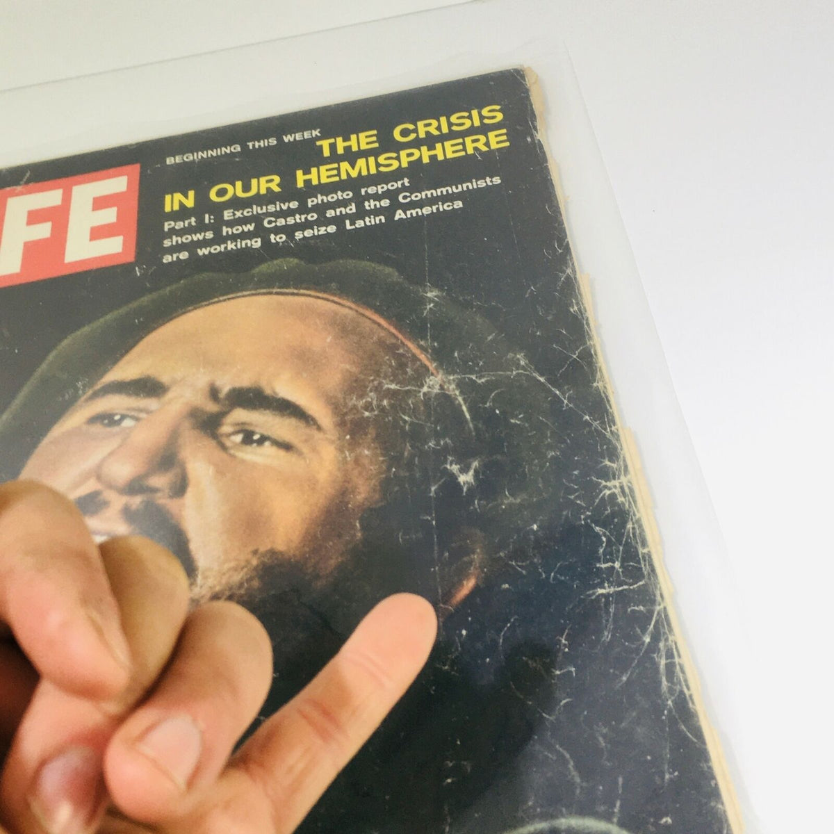 Another close-up view of the cover of VTG Life Magazine June 2, 1961, displaying the title 'The Crisis in Our Hemisphere' along with a detailed image of Fidel Castro’s face. The magazine is protected by a plastic cover.