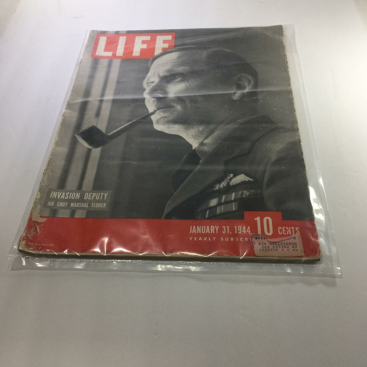 Vintage Life Magazine cover from January 31, 1944, featuring Deputy Air Chief Marshal Tedder. The magazine emphasizes its historical significance and captivating wartime imagery, with a price of 10 cents and a well-preserved appearance.