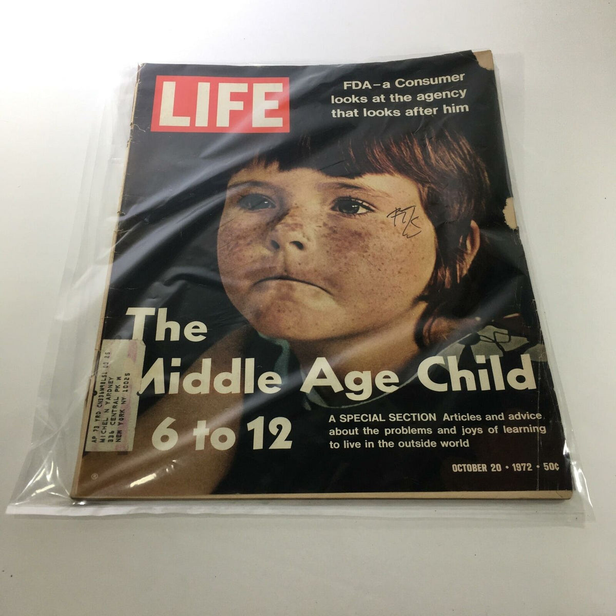 Vintage Life Magazine cover from October 20, 1972, featuring the title 'The Middle Age Child from 6 to 12'. The cover displays an illustration of a freckled child looking serious, showcasing the exploration of childhood themes in mid-20th-century America.