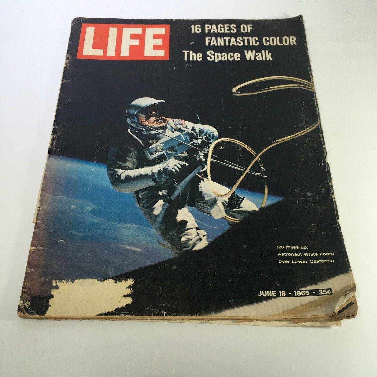 Life Magazine cover from June 18, 1965, featuring '16 Pages of Fantastic Color The Space Walk', showcasing an astronaut floating in space with Earth in the background.