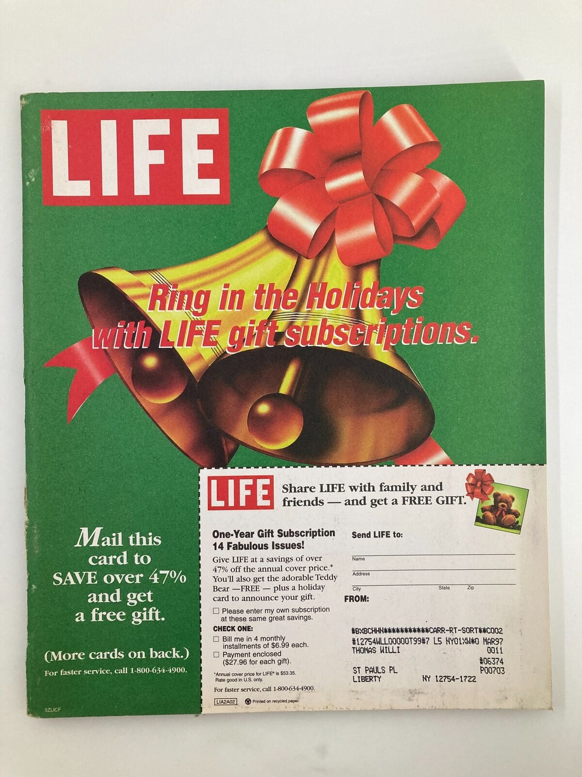 Life Magazine November 1995 subscription advertisement showcasing holiday gift subscriptions, featuring a festive design with bells and ribbons, promoting savings and a teddy bear offer.