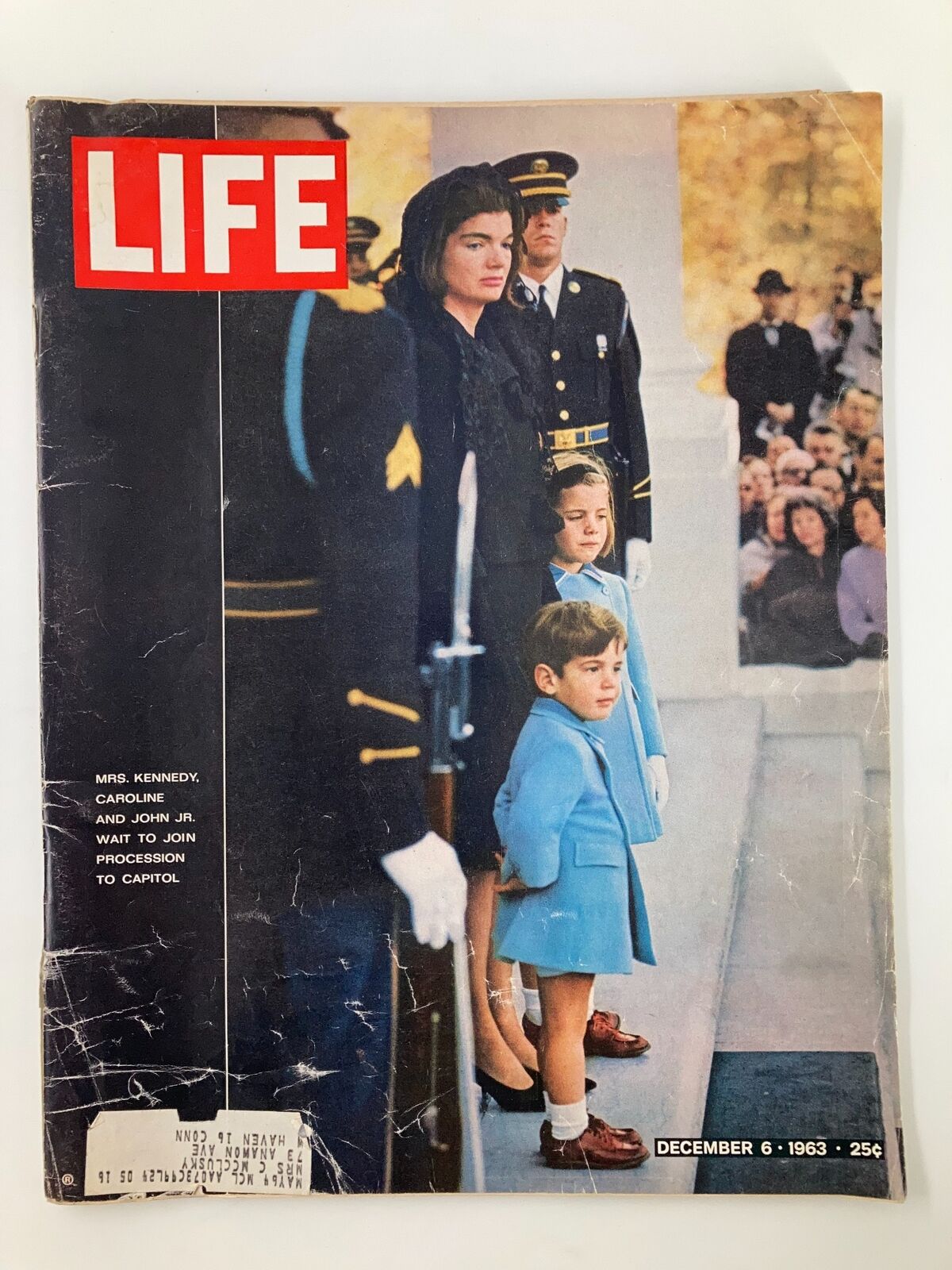 Vintage Life Magazine December 6 1963 featuring Jackie Kennedy, Caroline Kennedy, and John Kennedy Jr. during a poignant moment with surrounding onlookers, capturing an iconic moment of American history.