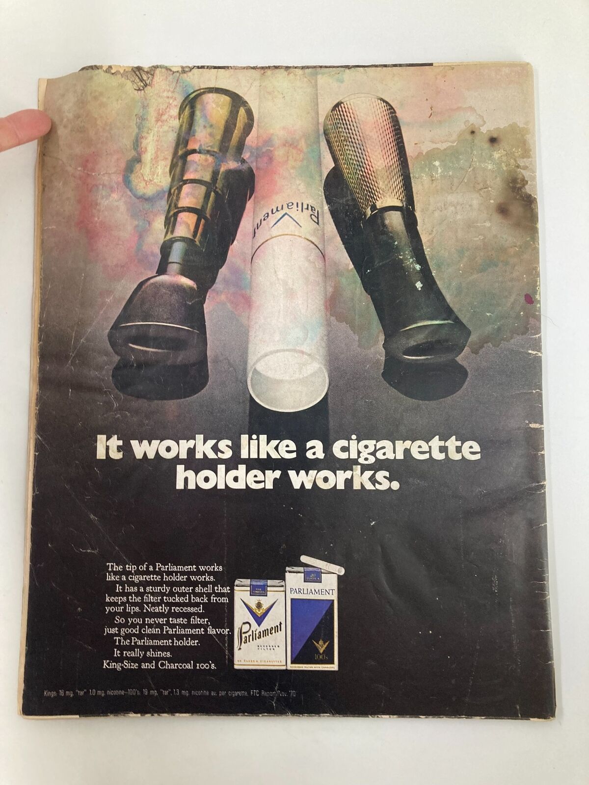 Vintage advertisement for Parliament cigarette holders from the VTG Life Magazine May 21 1971, featuring two cigarette holders and a distinct slogan about functionality.