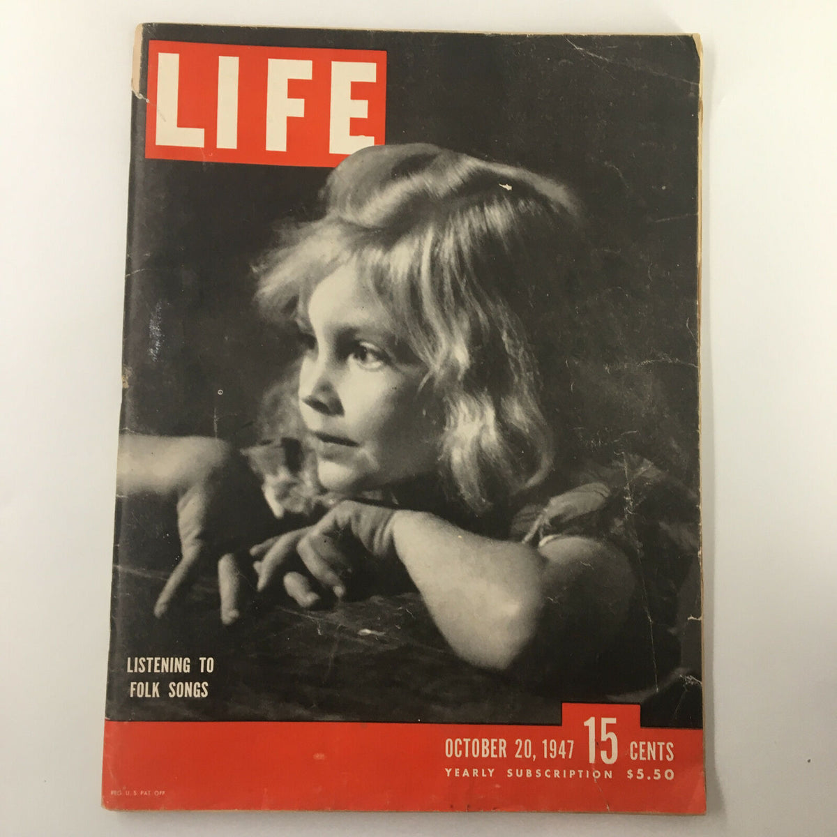 VTG Life Magazine October 20, 1947 cover featuring a little girl listening to folk songs, showcasing vintage charm and nostalgia.