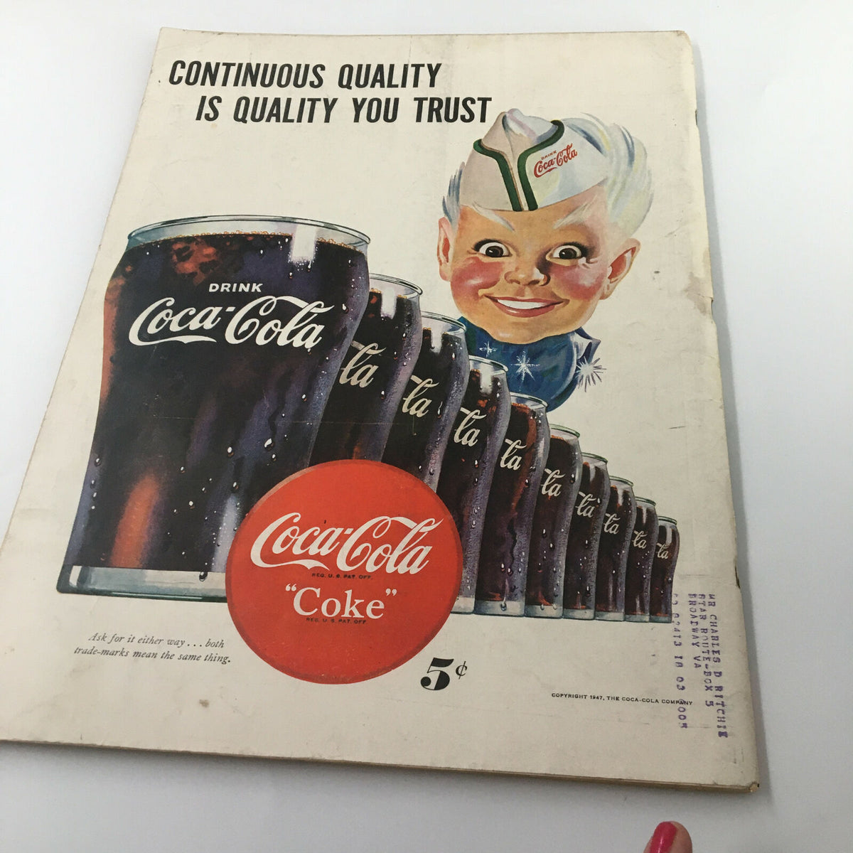 Back cover of the VTG Life Magazine October 20, 1947, featuring a vintage Coca-Cola advertisement with a smiling child and classic product imagery.