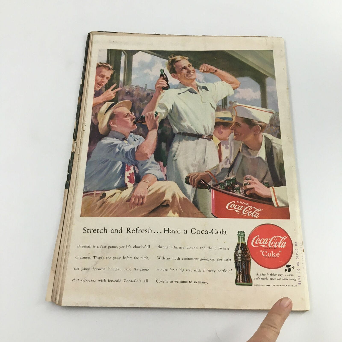 Inside page of VTG Life Magazine June 28, 1948 showcasing a Coca-Cola advertisement with cheerful spectators enjoying a baseball game, reflecting the social culture of the late 1940s.