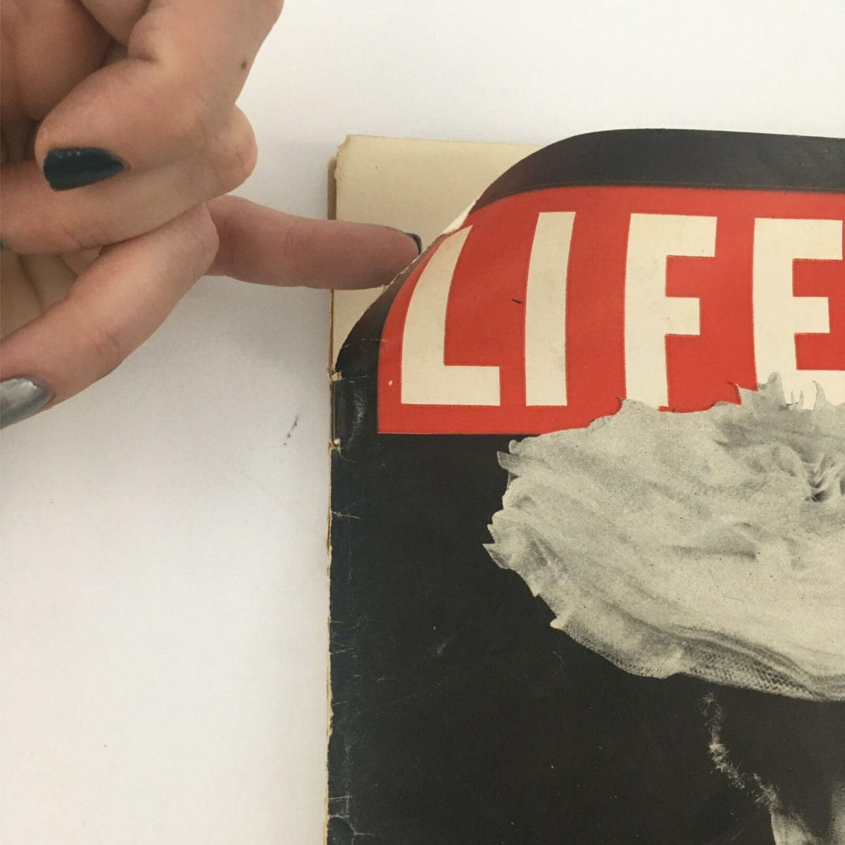 Image of the cover of the VTG Life Magazine January 28, 1946 with the title 'LIFE' and visible wear on the edge.