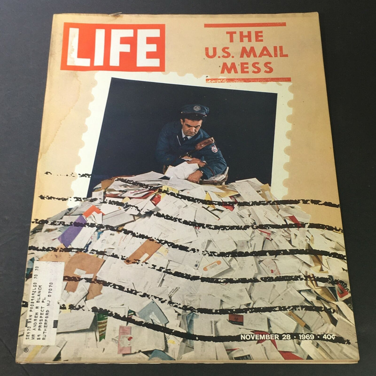 Vintage Life Magazine cover from November 28, 1969, featuring the title 'The U.S. Mail Mess' with an image of a postal worker surrounded by piles of mail.