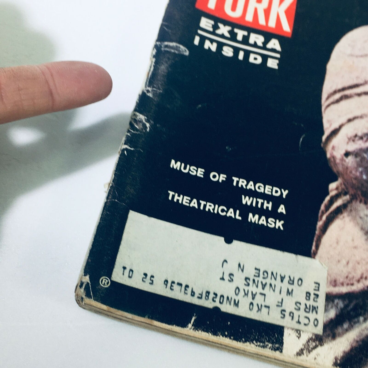 Close-up view of the VTG Life Magazine February 8 1963 revealing the Muse of Tragedy with a theatrical mask and an address label on the cover.
