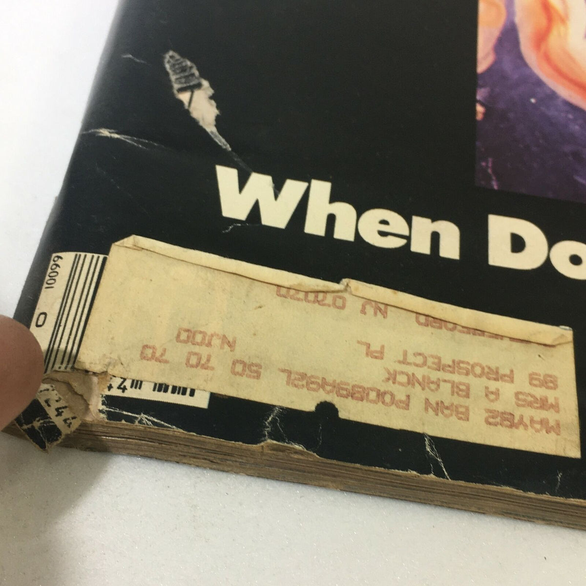 Close-up view of the spine of VTG Life Magazine November 1981, showing wear, address label, and publication details, emphasizing its vintage condition.
